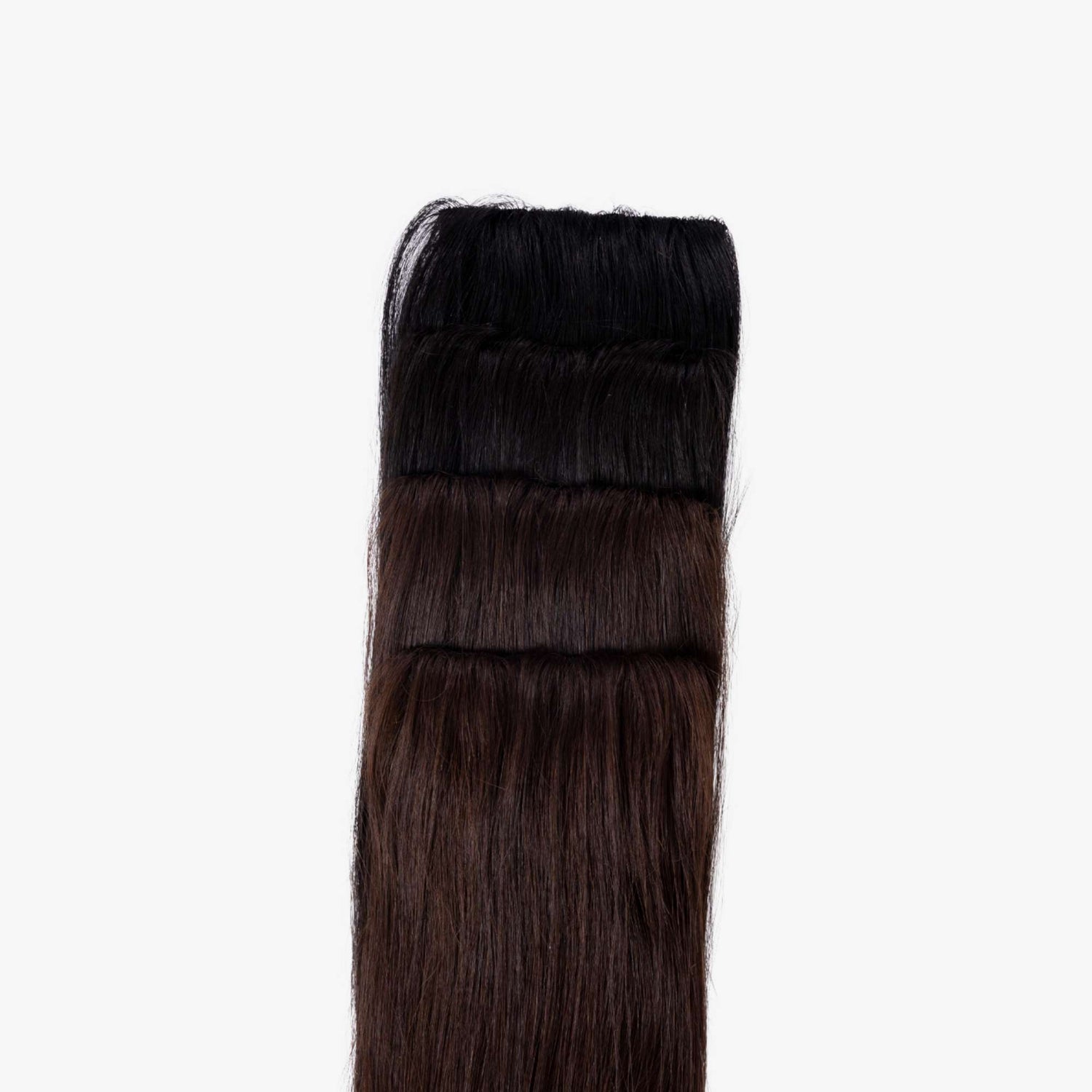Three undetectable hair patches in different shades of brown and black.